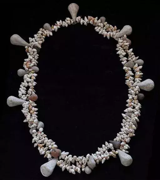 This necklace was reconstituted from 1500 coloured pearls and shells found in one of the tombs.