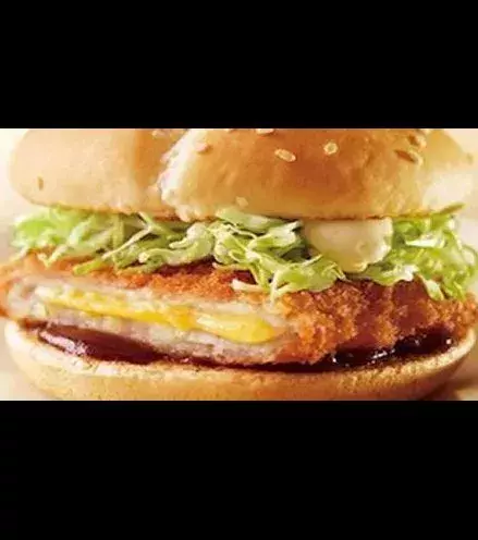 Cheese Katsu Burger (Japan): a patty of stuffed, breaded pork with Tonkatsu sauce