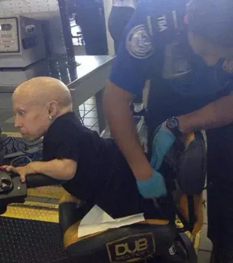 Even celebs aren’t safe from the TSA: Here we see Vern Troyer receiving quite the search and he doesn’t seem too impressed… 