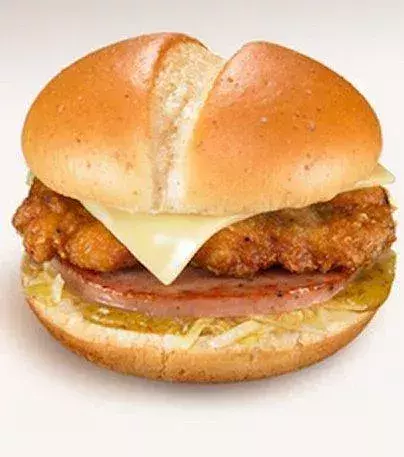 German Sausage Chicken (Japan): fried chicken thigh, sausage, grilled pork, cheese, sauerkraut and mustard