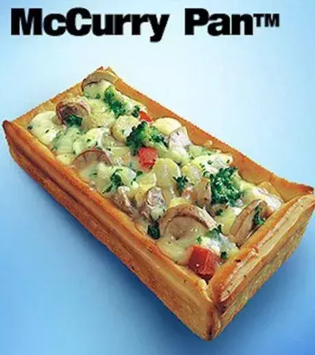 McCurry Pan (India): inside a bread container with vegetables and tomato curry