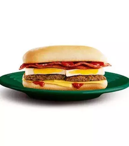 McDeluxe Brekkie Roll (Australia): a hotdog bun with bacon and an egg