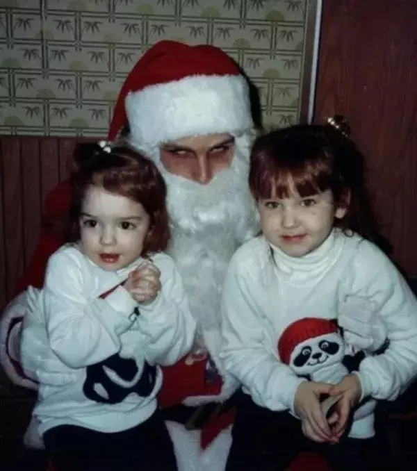 Who is hiding behind this Santa Claus costume?